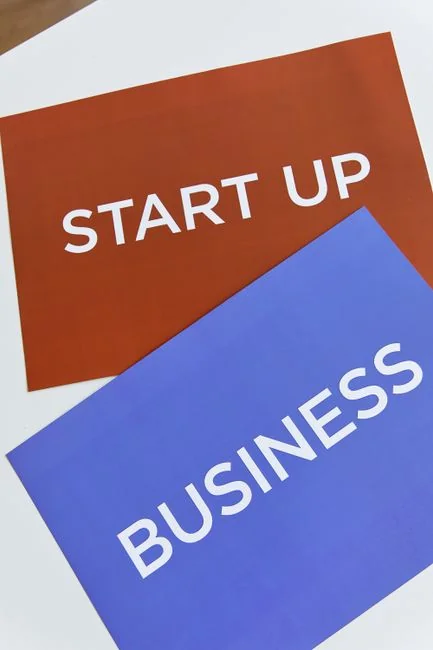Group of business professionals collaborating in an office setting.